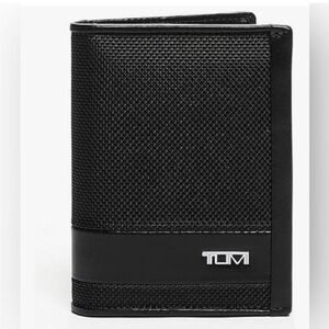 Tumi Black Textured Wallet new without tags in excellent condition
